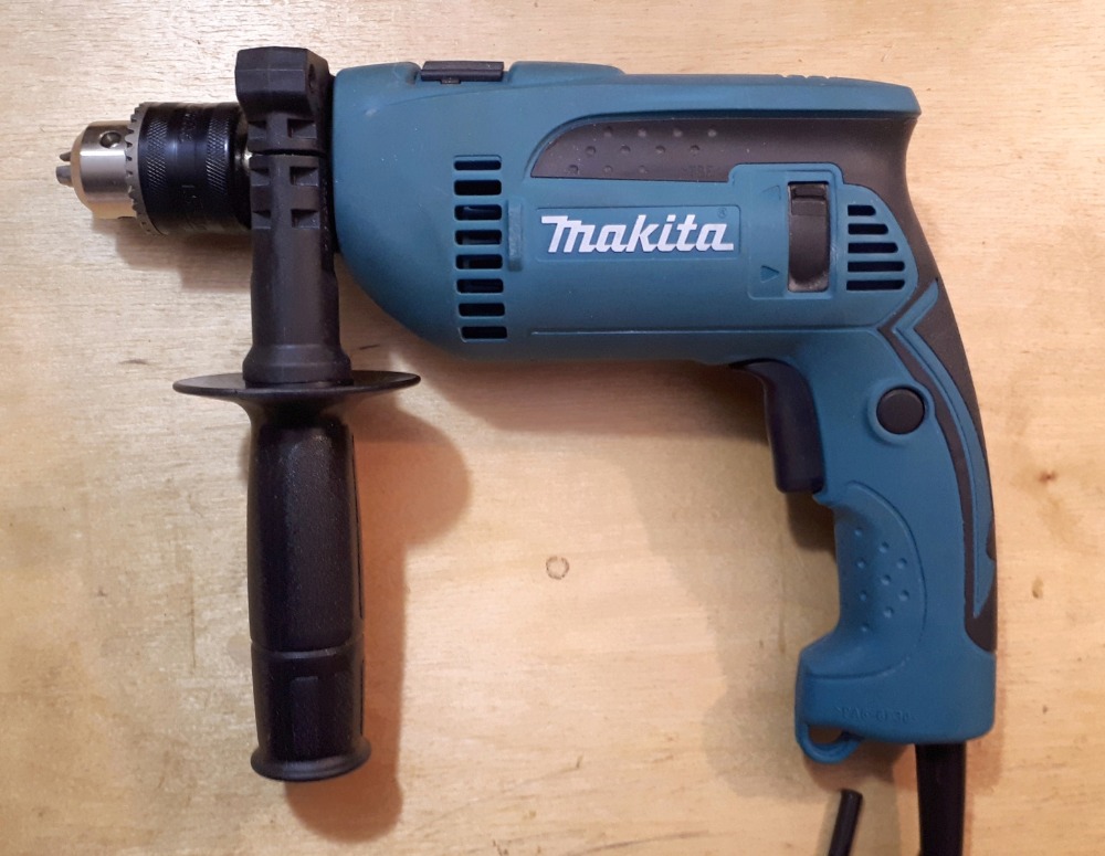 Дрель ударная Makita HP1640K